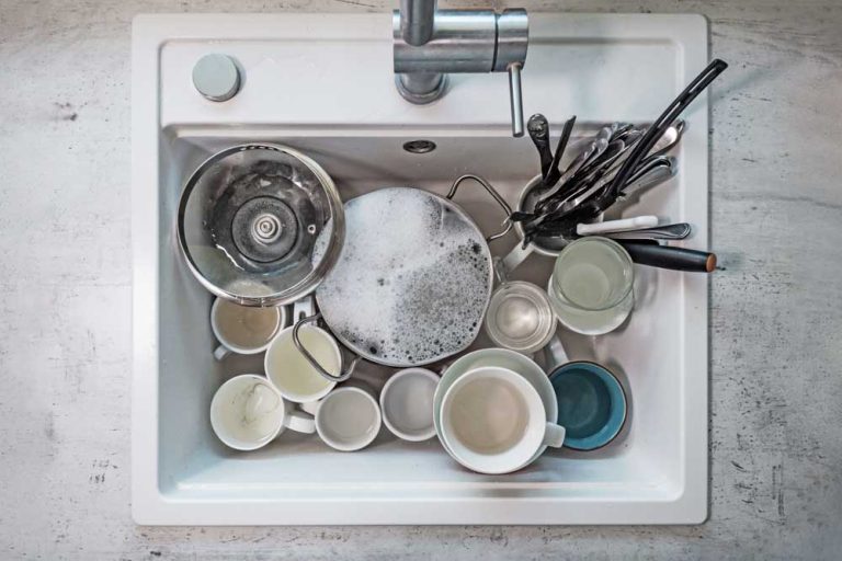 plates in kitchen sink